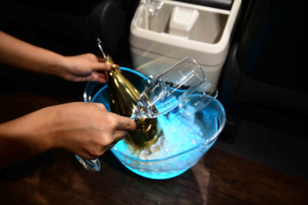bottle and glass of wine - Club Tipsy Cebu VVIP Limo Service